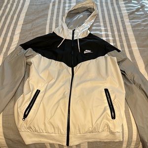 Nike rain jacket, black, white and grey. Size Medium
